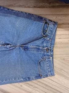 Two Blue Denim Jeans