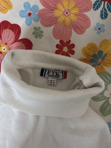 White Turtleneck Top