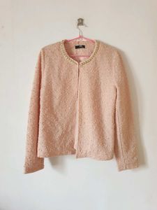 Chic Pearl-Trimmed Blush Jacket