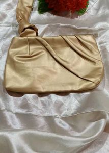 Elegant Gold Satin Clutch