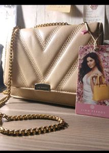Lino Perros Quilted Sling Bag