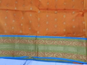 Orange and sky blue combination saree