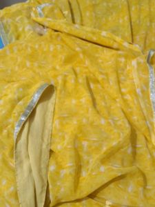 Yellow Saree with beautiful Flowers