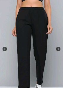 black solid knitted track pants with 2 pockets.