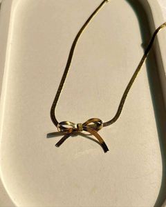 Gold Bow Snake Chain Necklace