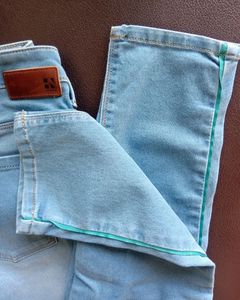 Light Wash Jeans with Green Stripe