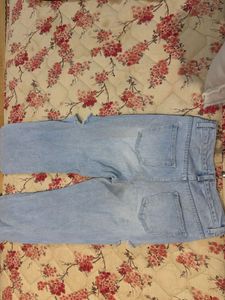 Ripped Light Wash Denim Jeans