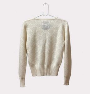 Elegant Ruffled Cardigan Sweater