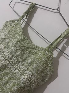 PEPLUM EMBROIDERED SLEEVLESS TOP