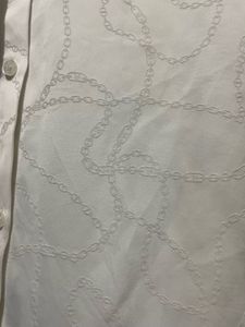 Elegant White Ruffled Blouse