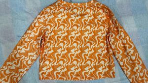 Orange Swirl Long Sleeve Crop Top