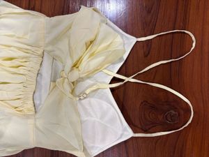 Padded butter yellow backless maxi dress
