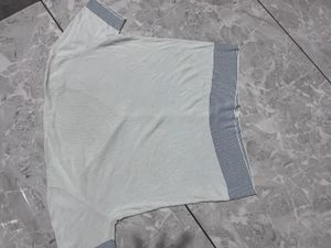 White Sleeveless Shirt