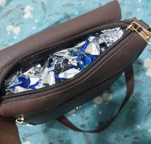 BRAND NEW SLING BAG.