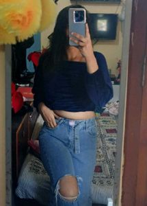 Top and Ripped Knee Jeans