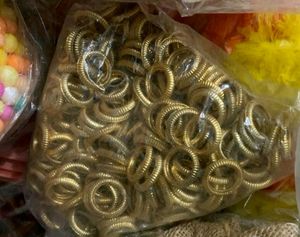 20 Pcs. of Golden Shiny Plastic Rings with hole