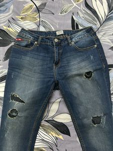 Ripped Blue Denim Jeans