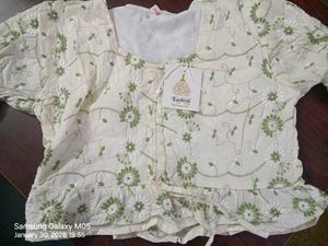 EMBROIDERED PEPLUM CROP TOP