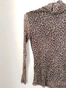 leopard print turtle neck mesh top.