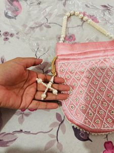 Regal Pink Pearl Potli Bag with Embellished Handle