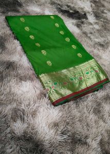 green banarasi saree