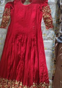 a good conditioned red embroidered gown or frock s
