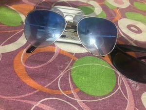 Both Sunglasses At Very Good Condition.