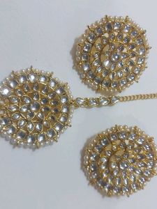Golden Earrings And Mangtika Set.