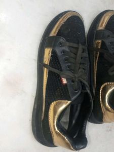 Stylish Black & Gold Sneakers
