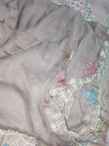 Unstitched Embroidered Dress Material