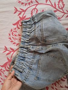 Distressed High-Waisted Denim Jeans