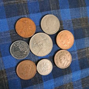 8 Coins Of Different Foreign Countries