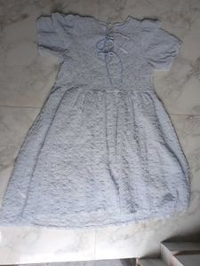 Light Blue Textured Dress With Bow Detailing