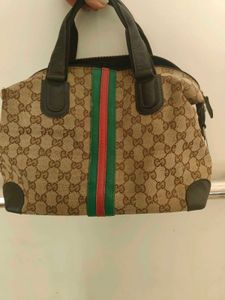 Gucci Look Handheld Bag