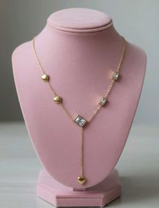 Heart strings lariat necklace