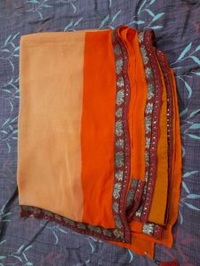 Classicate Orange Embroidered Chiffon Saree