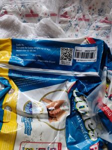 19 Unused Diapers From 24 Diaper Packet.