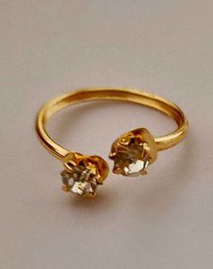 Gold Rings with Gemstone Details