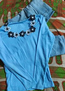 Light Blue High-Waisted Jeans And Bule Top