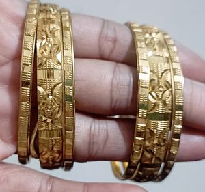 2 Set Of Gold Plated Bangles