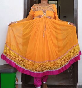 Orange Churidar With Stonework