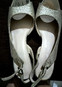 New sparkly gold stilettos.