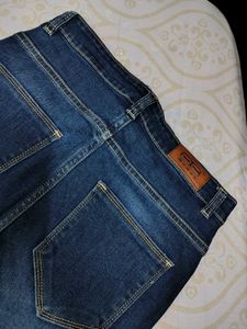 Distressed Denim Jeans