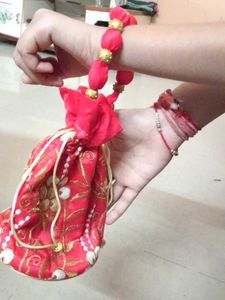 lowest price red and golden potli bag