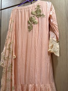 peach gown with cowl and attached drape