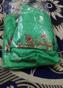 Green  unstitched suit salwar with pure dupatta