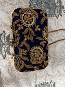 Embroidered box clutch