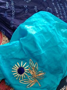 blue bandhej saree with butta in blouse and saree.fresh piece saree and blouse