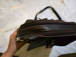 Brown Mini Backpack with Charm