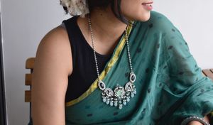 Elegant Silver-Toned Necklace with earrings